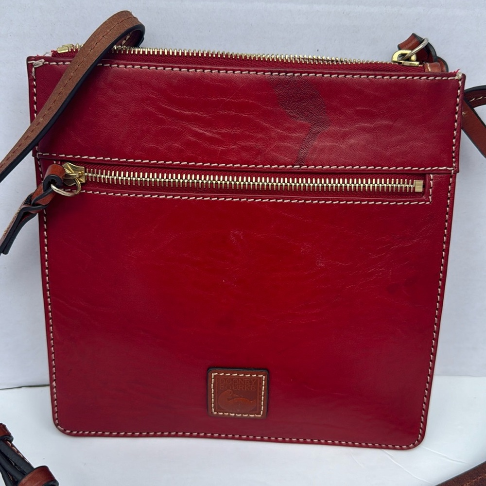 Rich red leather Dooney and Bourke crossbody purse